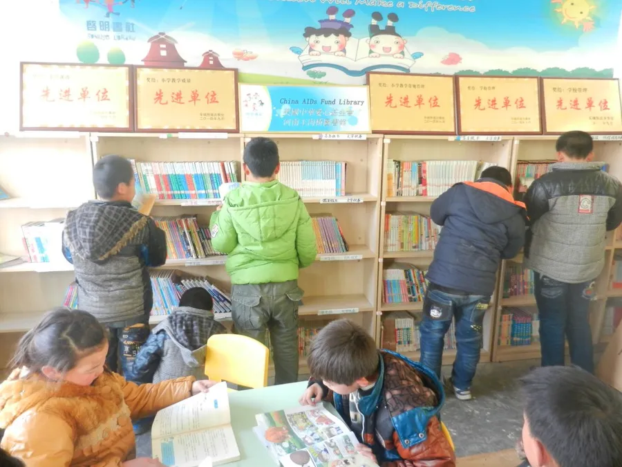 Books sorted by grade, so every age finds something to read, Henan children's center.